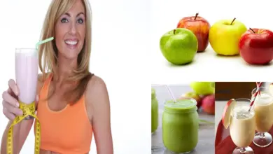 10 recetas de batidos de manzana para bajar de peso y desintoxicar tu cuerpo Foto de un batido de manzana verde en un vaso de vidrio con hielo y una pajita